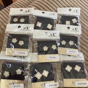Lot of 9 costume jewelry earrings.